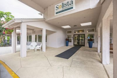 Entrance of Solista Wilmington with seating area.
