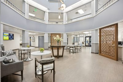 Bright common area with seating and decor