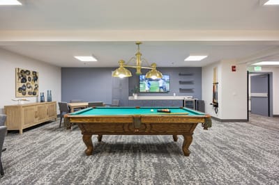 Billiards table in a common area at the facility.