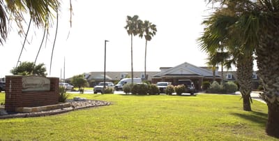 Exterior view of Cimarron Place with landscaping