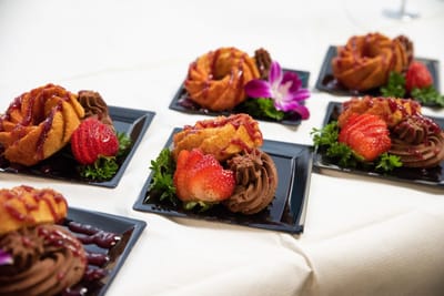 Plated desserts with strawberries and chocolate mousse