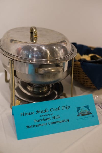 Serving dish with crab dip at a retirement community event