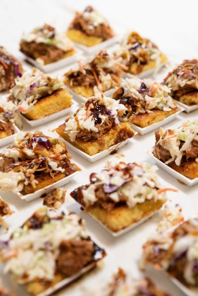 Plated food items with pulled pork and coleslaw