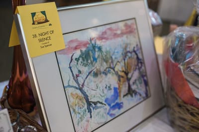 Framed artwork at a fundraising event