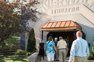 Residents entering the facility for an event