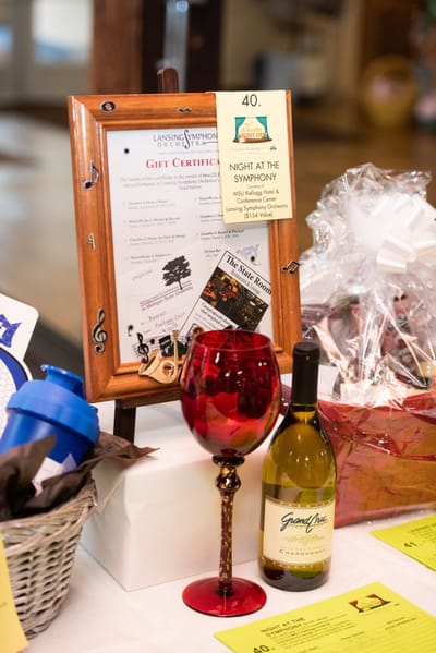Table setting with wine and gift certificates