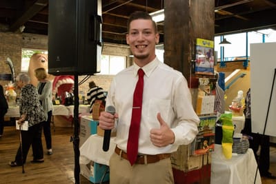Staff member engaging with residents at an event