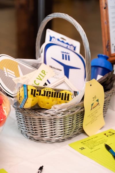 Basket with event prizes and supplies