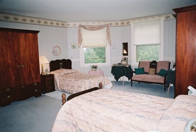 A cozy shared bedroom in an assisted living facility