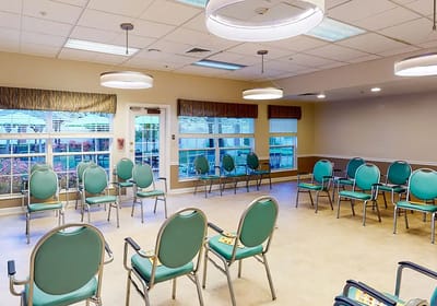 Indoor activity room with chairs arranged in a circle