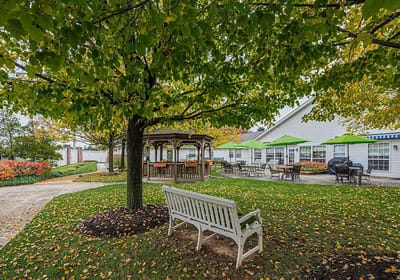 Outdoor garden area with gazebo and seating