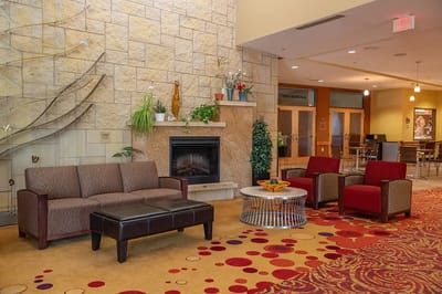Interior common area with seating and fireplace