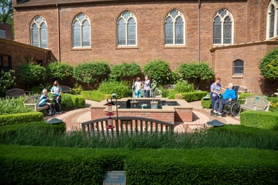 Residents enjoying the outdoor garden area