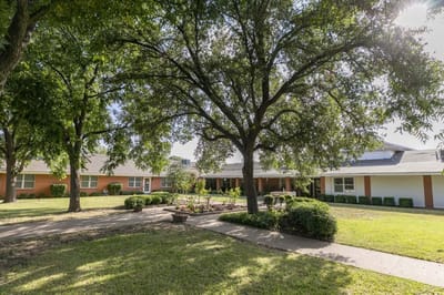 Outdoor view of landscaped area in a senior living facility