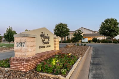 Exterior view of Wesley Court Senior Living entrance