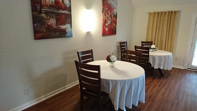 Dining area with tables set for meals