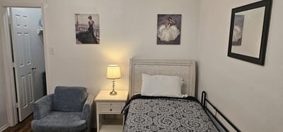 Cozy resident room with decor and furniture