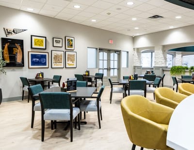 Interior dining area with tables and chairs