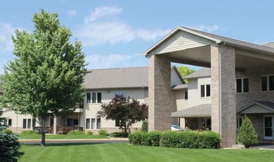 Exterior view of the facility surrounded by landscaping