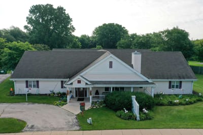 Aerial view of Lakepoint Villa building and garden