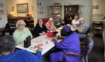 Residents engaged in an arts and crafts activity