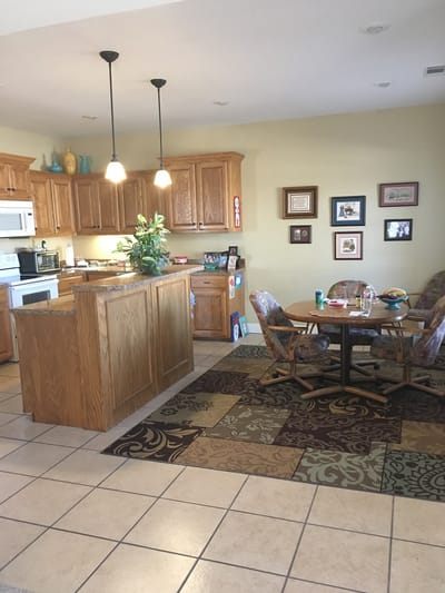 Bright kitchen area with dining table and chairs