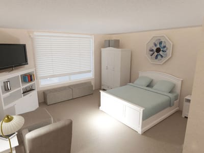 Bright, well-furnished resident room with a bed and TV