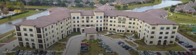 Aerial view of Grand Living at Tuscan Lakes building