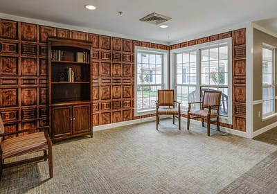 Bright seating area with wooden accents and large windows