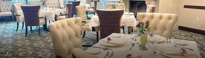 Elegant dining room setup with floral decor