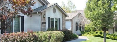 Exterior view of the Pacific Living Centers building with landscaping