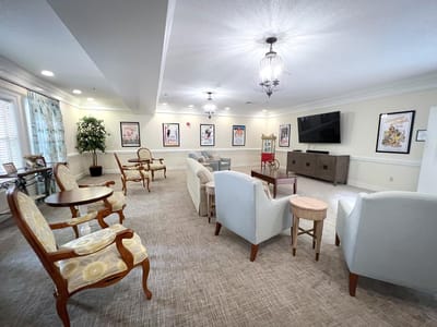 Bright common area with seating and artwork