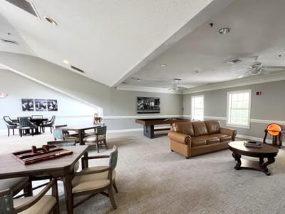 Common area with seating and game tables