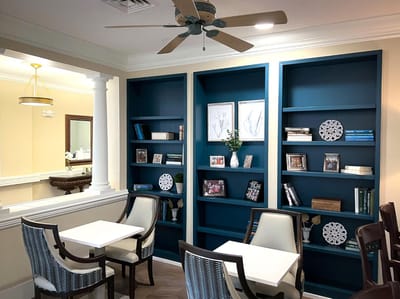 Common area with shelving and seating