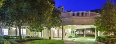 Exterior view of Bloom at Bossier entrance at dusk