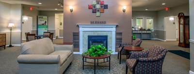Cozy common area with seating and fireplace