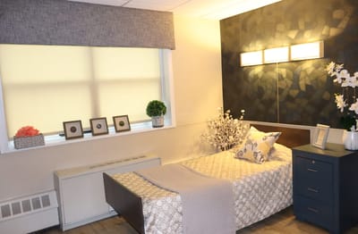 Cozy resident room with a bed and decor
