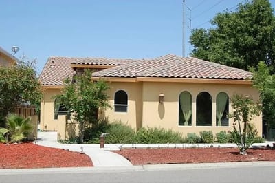 Exterior view of a residential building with landscaping