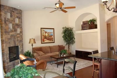 Cozy common area with seating and a fireplace