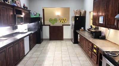 Kitchen area with cabinets and appliances