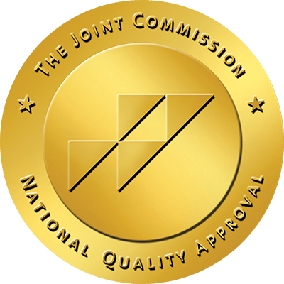 National Quality Approval logo on a gold background