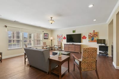 Common area with seating and television
