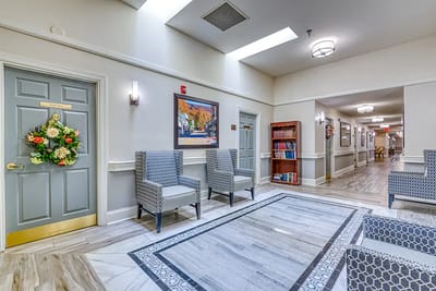 Bright common area with seating and artwork