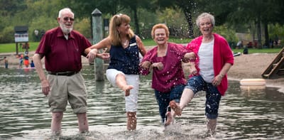 Residents and staff enjoying a water activity together