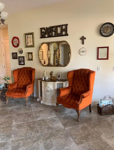 Brightly decorated common area with comfortable chairs
