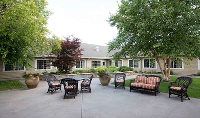 Outdoor seating area with tables and chairs