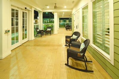 Quiet interior hallway with rocking chairs
