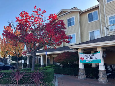 Exterior view of Arbol Residences with colorful trees