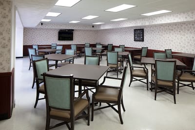 Dining room with tables and chairs arranged neatly