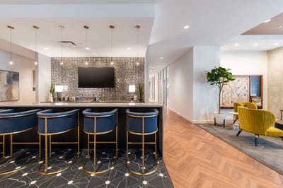 Bright and modern common area with seating and decor